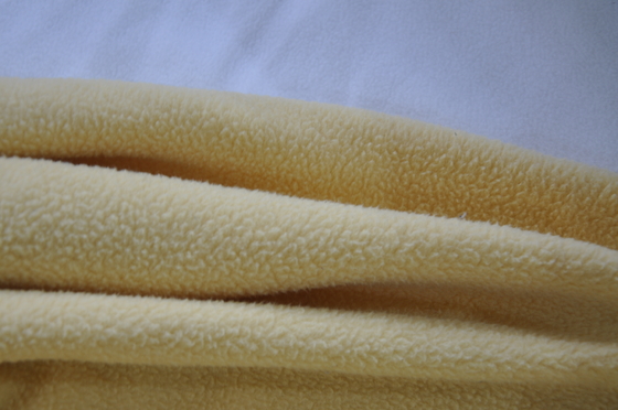 300gsm onde entretenue 100% du polyester 150cm ou tissu réglable de laine polaire
