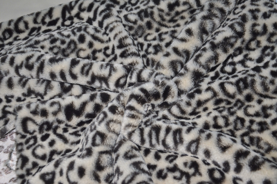 Tissu 100% luxueux de polyester d'impression de léopard pour la mode unique
