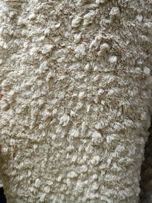 Tissu tricoté en tissu de fleurs de coupe de chameau 610gm